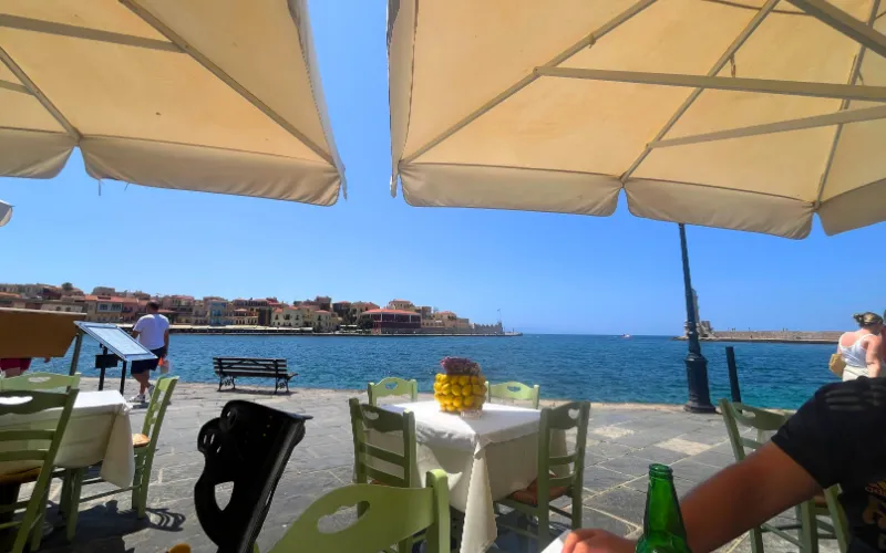 5 days in Crete Itinerary - Drinking in a bar on the Venetian Harbour, Chania - Amy Loizou